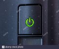 green-glowing-power-button-closeup-2C0NPCG.jpg