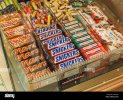 chocolate-bars-on-display-in-a-shop-including-mars-bars-snickers-bars-and-twix-2AFY5JH.jpg