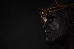 jesus-christ-statue-with-gold-crown-thorns-3d-rendering-side-angle-empty-space.jpg