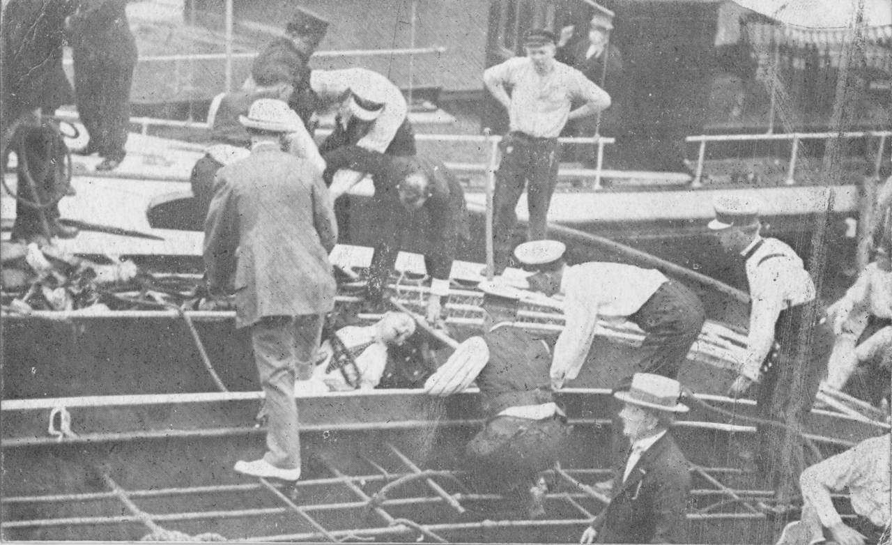 1280px-Eastland_Postcard_-_Police_recover_bodies_from_between_decks.png