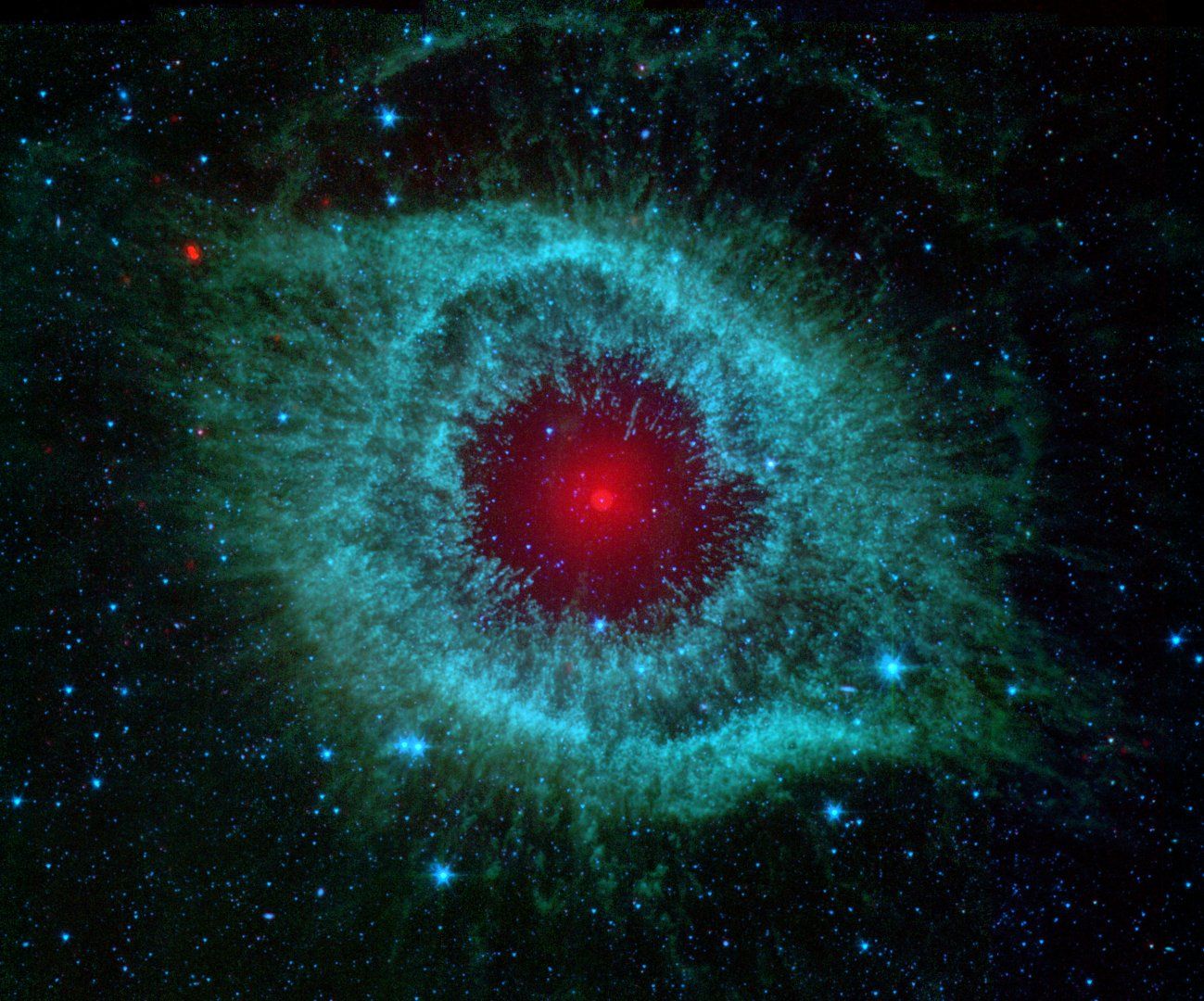 Comets_Kick_up_Dust_in_Helix_Nebula_(PIA09178)-min.jpg