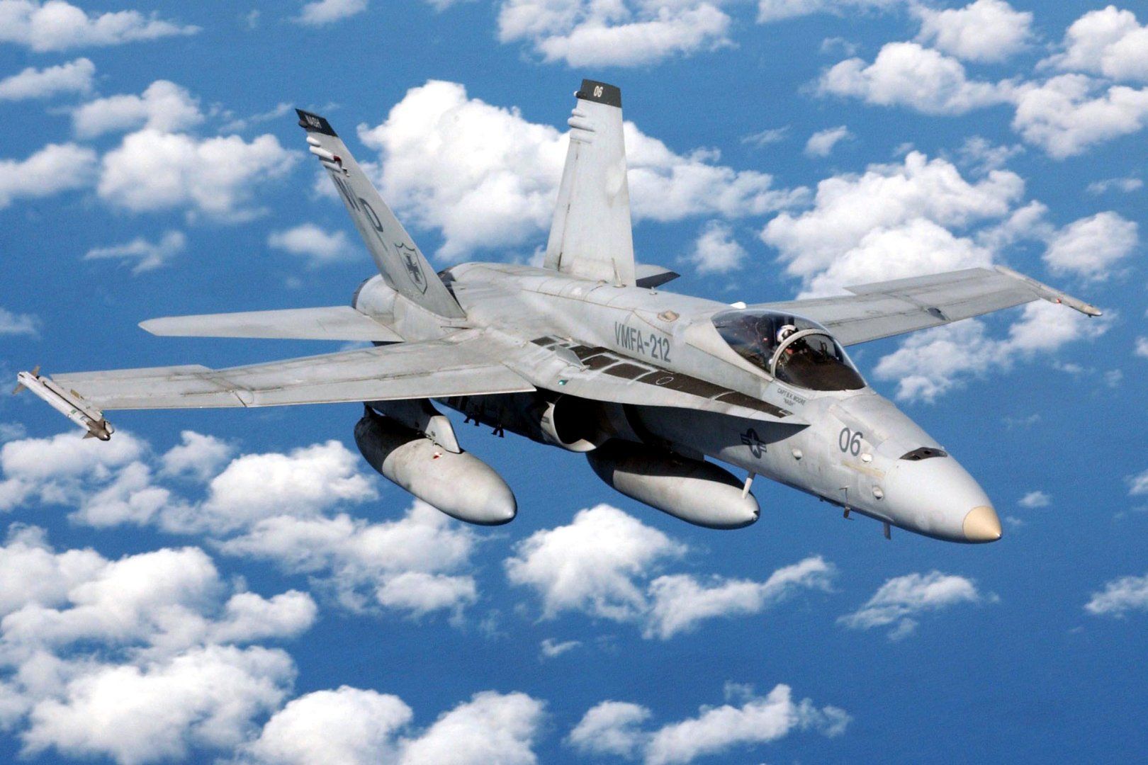 McDonnell_Douglas_FA-18C_Hornet_of_VMFA-212_in_flight_over_the_South_China_Sea_on_8_October_20...jpg