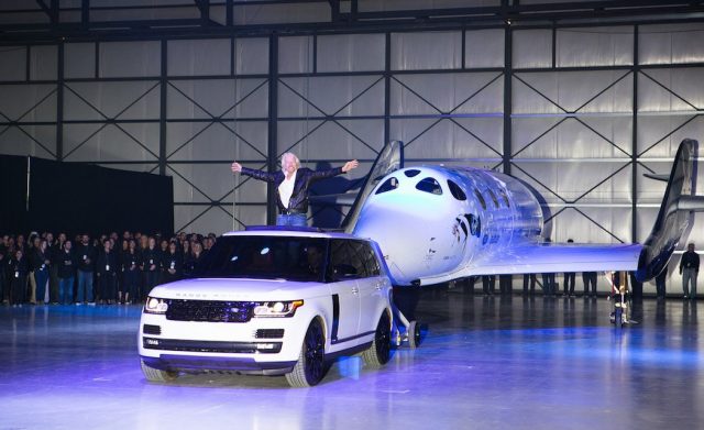 Virgin Spaceship Unity is unveiled in Mojave, California, Friday February 19th, 2016. VSS Unity is the first vehicle to be manufactured by The Spaceship Company, Virgin Galactic's wholly owned manufacturing arm, and is the second vehicle of its design ever constructed. VSS Unity was unveiled in FAITH (Final Assembly Integration Test Hangar), the Mojave-based home of manufacturing and testing for Virgin Galactic's human space flight program. VSS Unity featured a new silver and white livery and was guided into position by one of the company's support Range Rovers, provided by its exclusive automotive partner Land Rover...