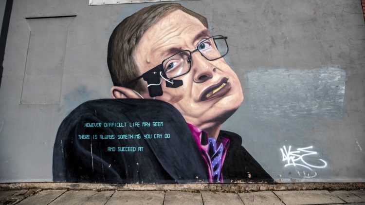 A mural of physicist Stephen Hawking features on the side of a building in Liverpool. The streets of the city have been transformed with bursts of colour as artists make their mark. (Photo by Peter Byrne/PA Images via Getty Images)